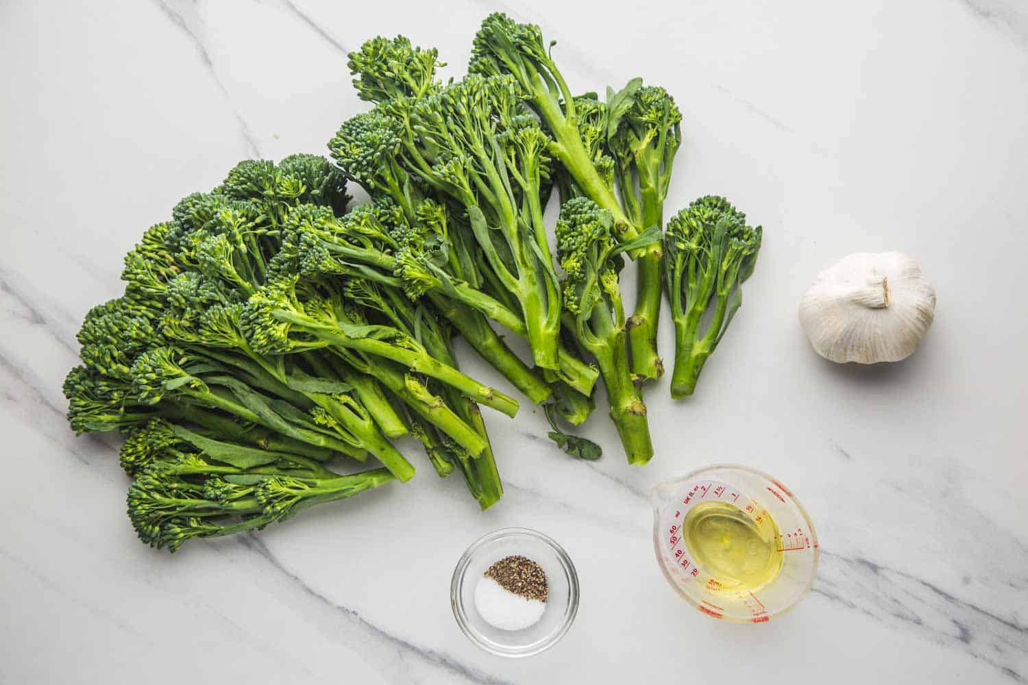 Roasted Broccolini Ingredients including broccolini, garlic, olive oil, salt & pepper.