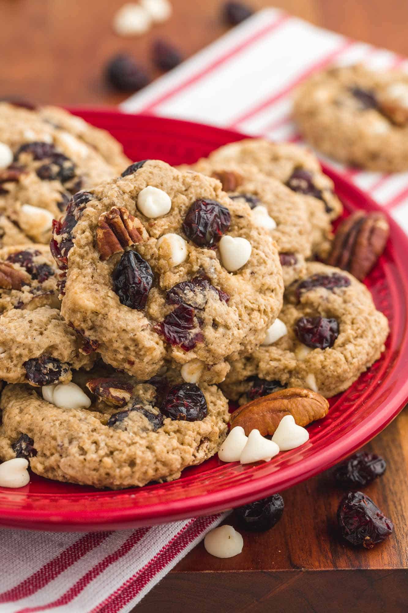 Cranberry oatmeal cookies on a red plate