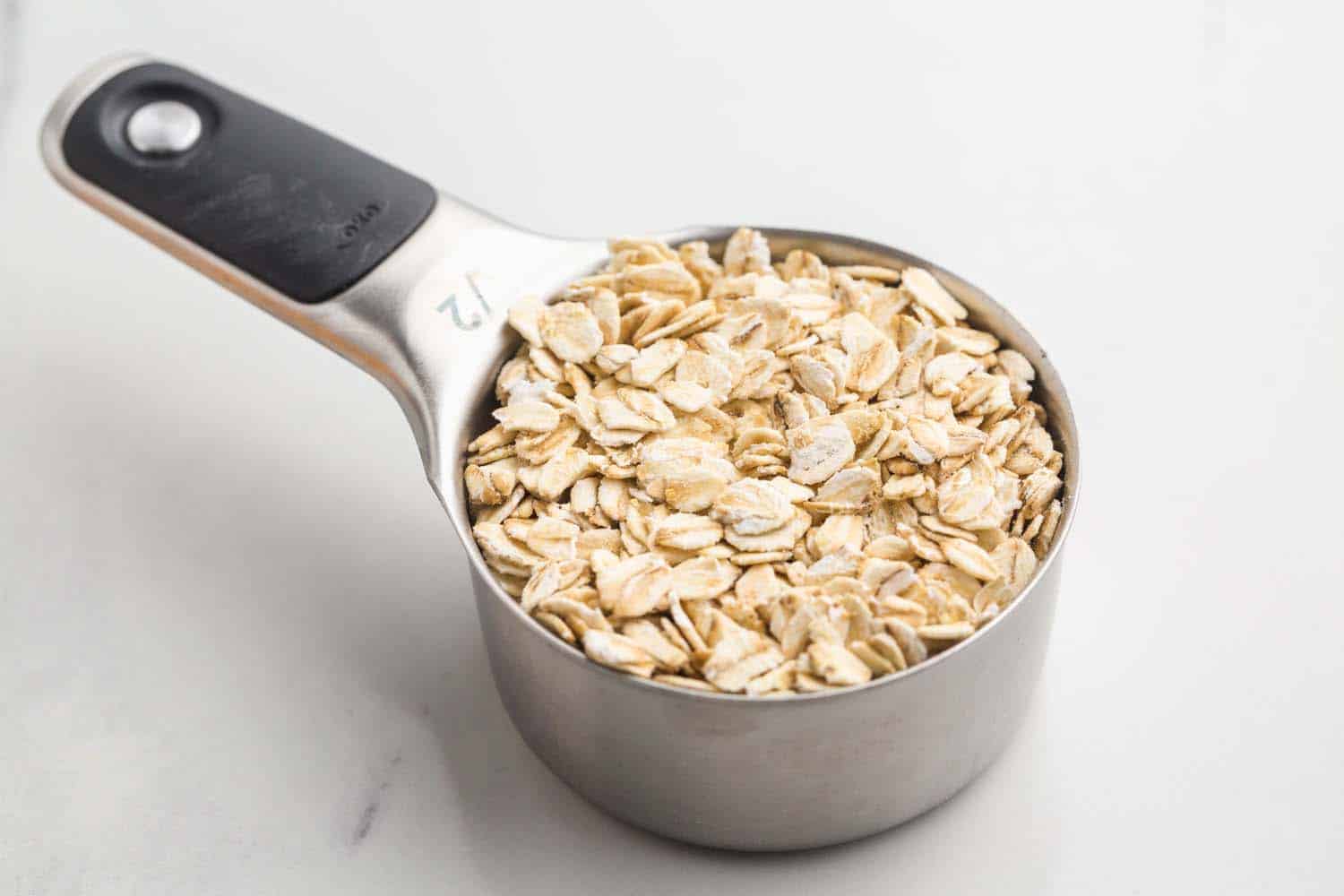 Oats in a measuring cup