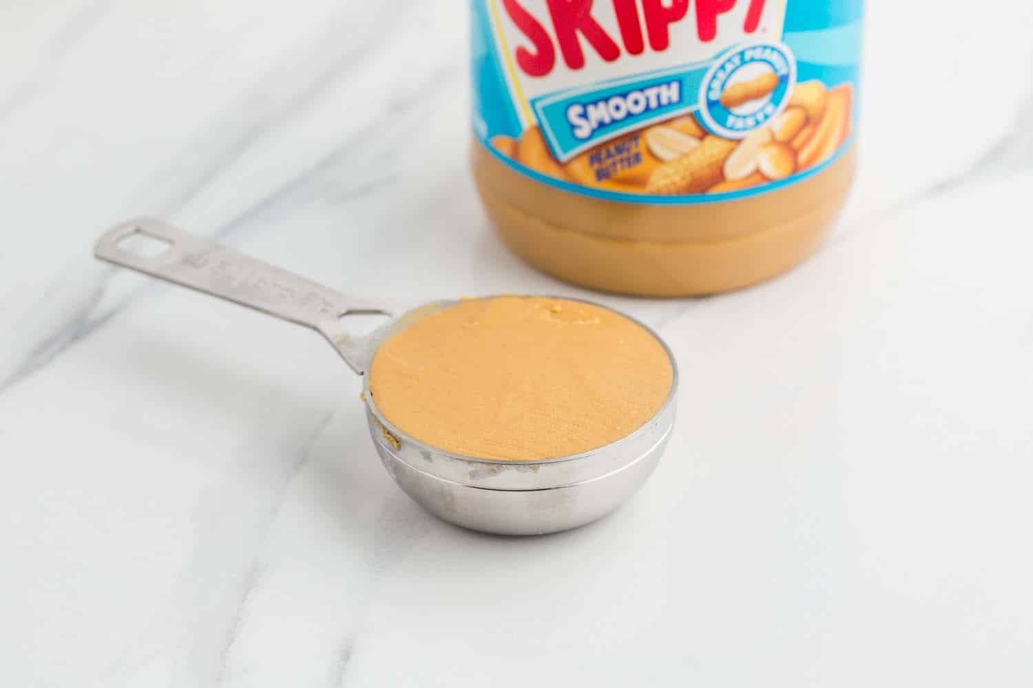 peanut butter in a measuring cup