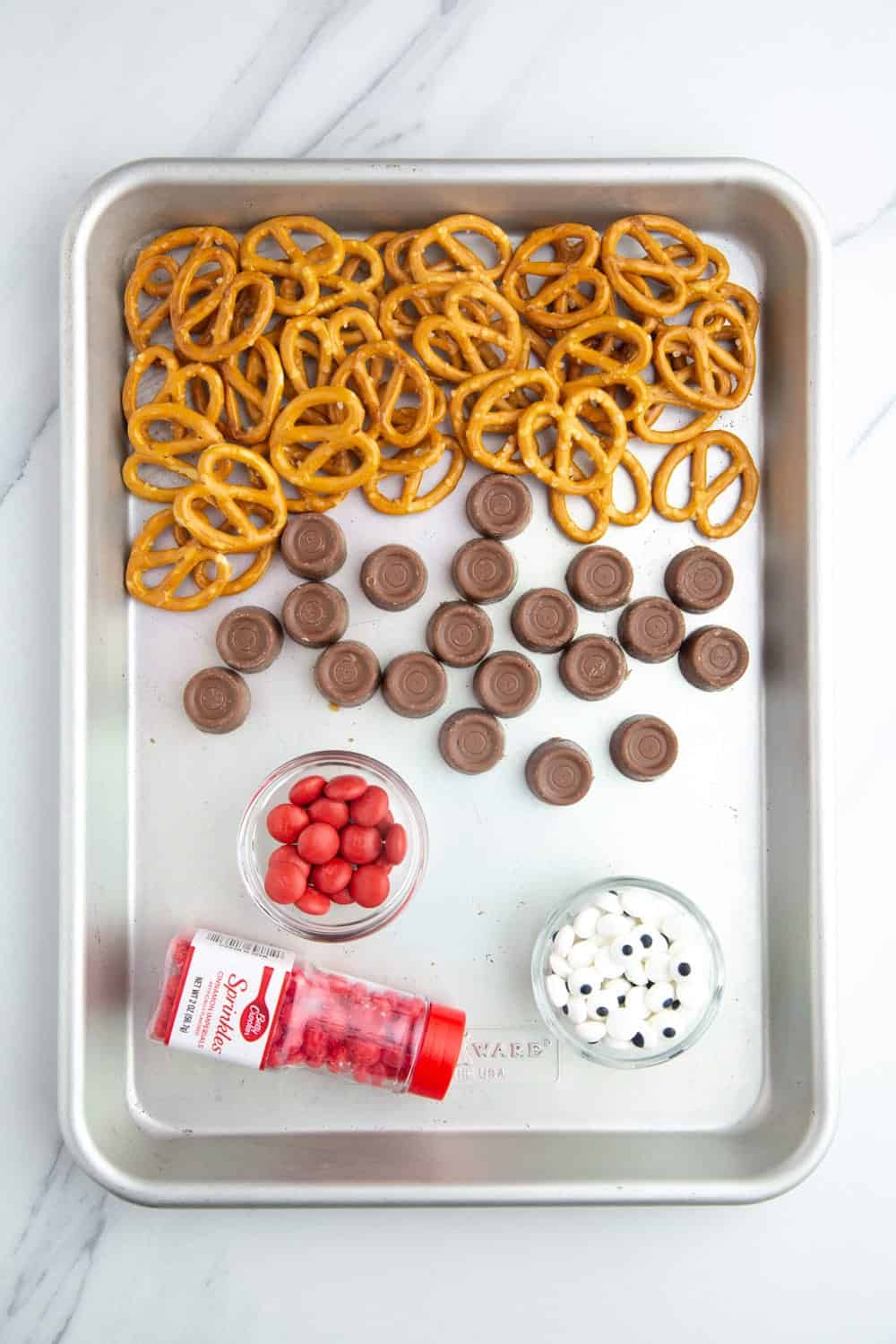 Ingredients needed to make rolo reindeer pretzels
