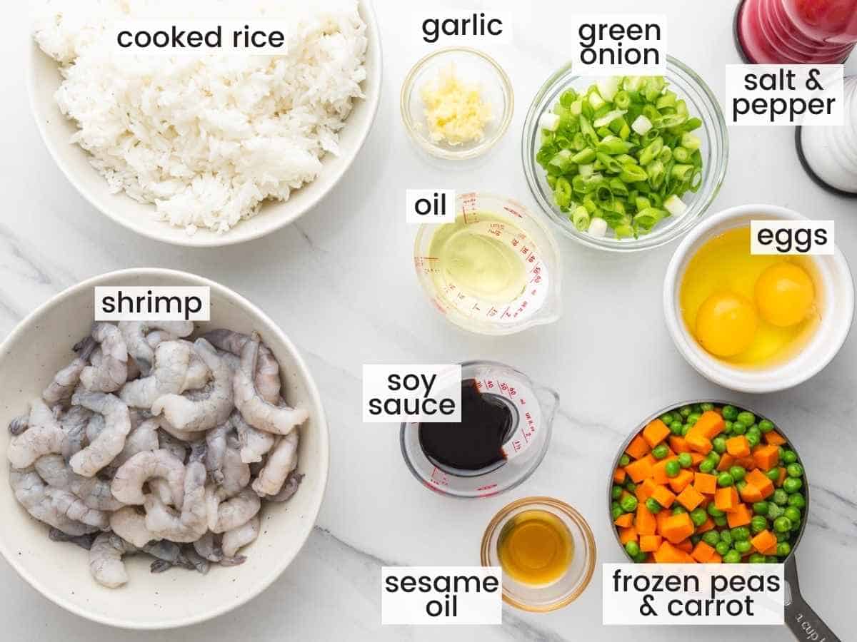 Overhead shot of ingredients needed to make shrimp fried rice