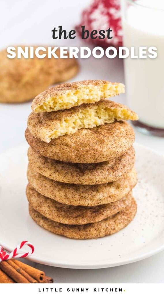 Stack of snickerdoodle cookies, with one bite shot and a glass of milk in the background. And overlay text that says "the best snickerdoodles"
