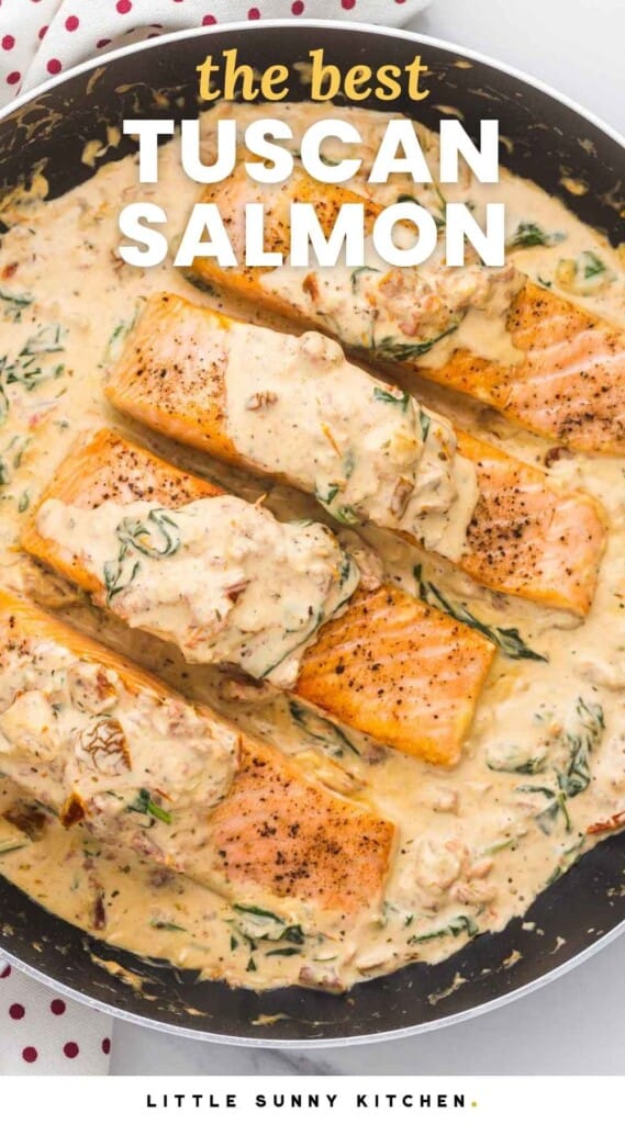 Overhead shot of tuscan salmon in a pan with cream sauce. With overlay text that says "the best tuscan salmon"