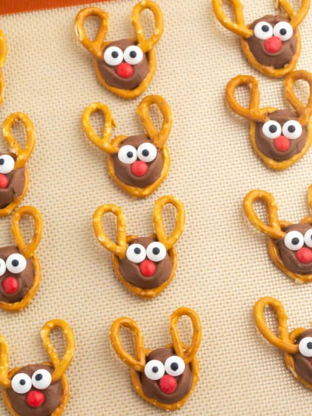 Reindeer pretzels on a silicone baking sheet