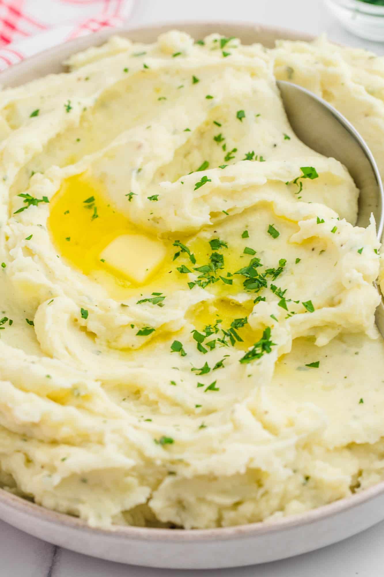 Creamy mashed potatoes served in a semi shallow dish