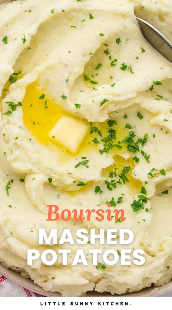 Close up shot of mashed potatoes garnished with parsley and a piece of butter, and overlay text that says "Boursin Mashed Potatoes"