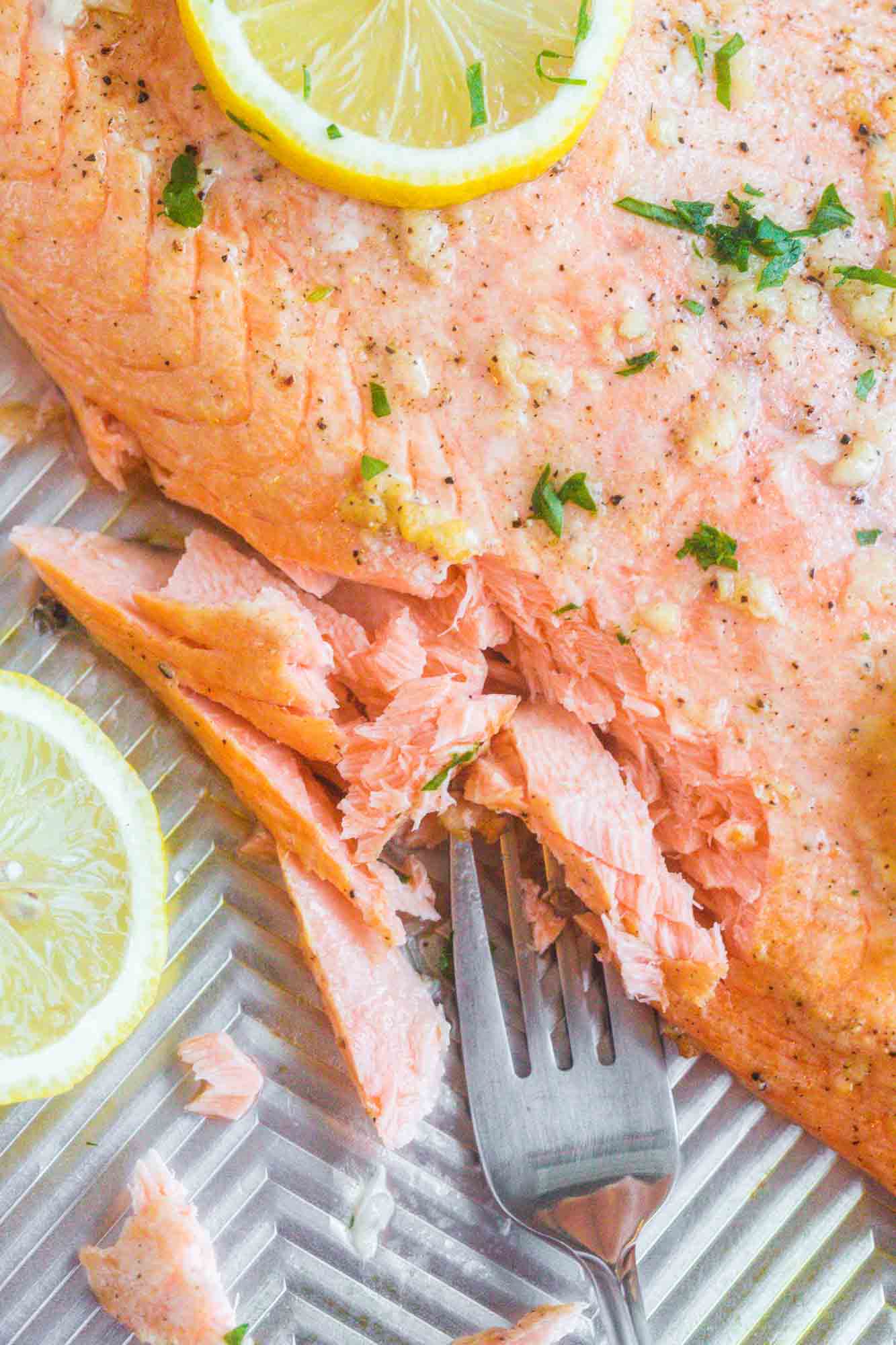 Flaked salmon with a fork