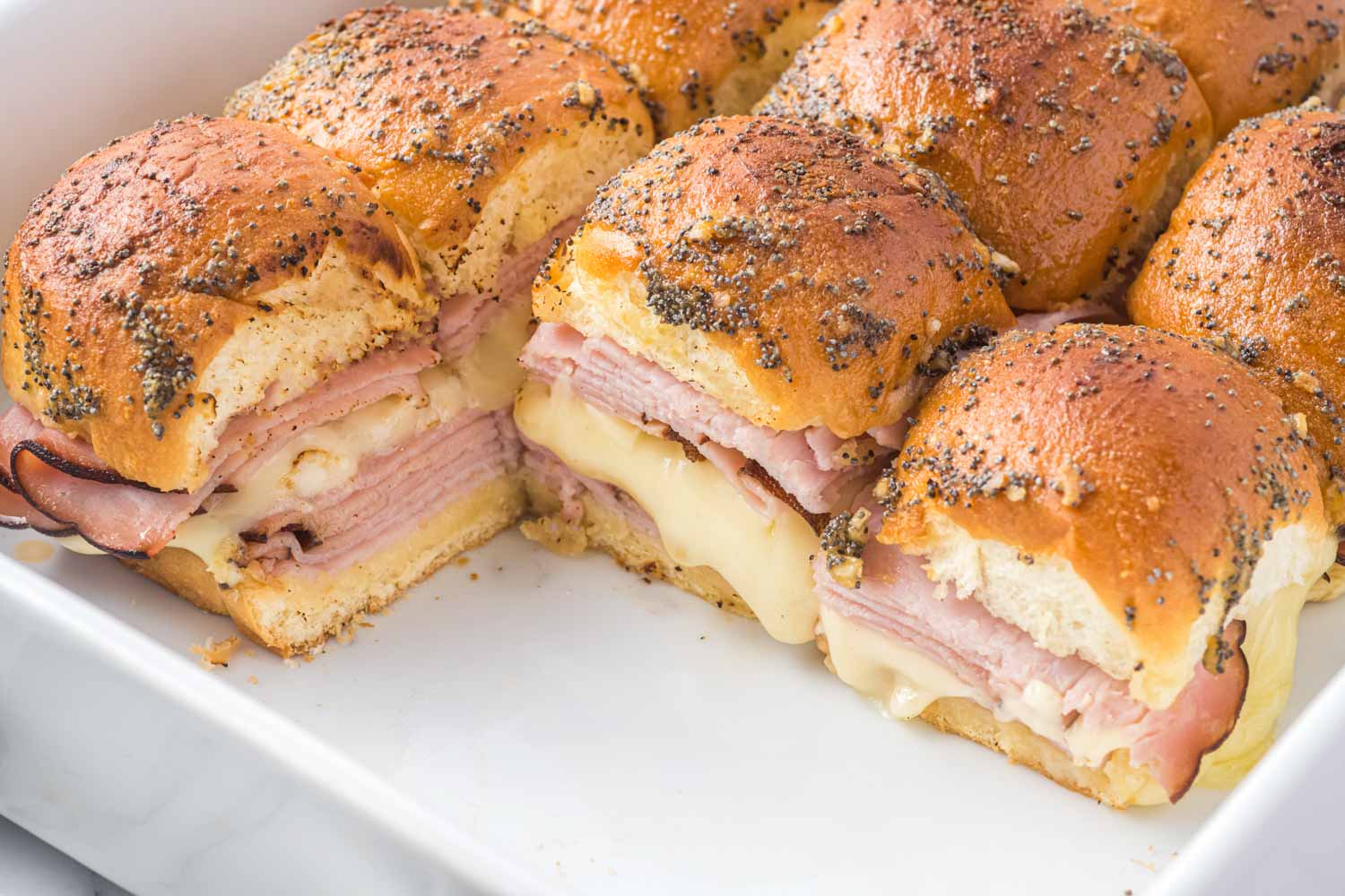 Ham and cheese sliders in a pan