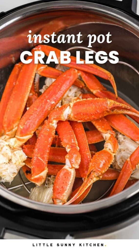 Fully cooked crab legs in the instant pot placed on a trivet. With overlay text that says "Instant Pot Crab Legs"