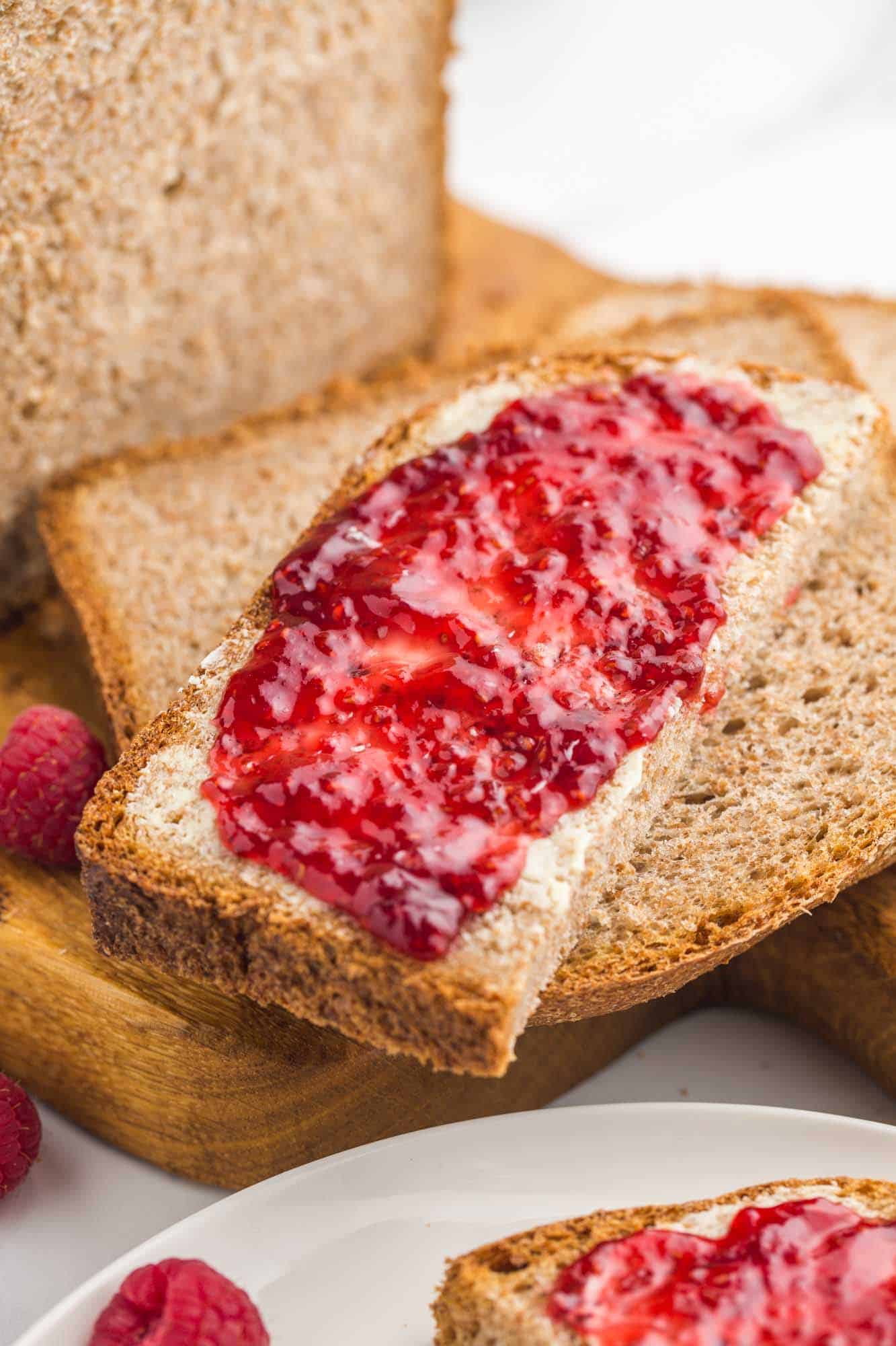 Fresh whole wheat bread with raspberry jam