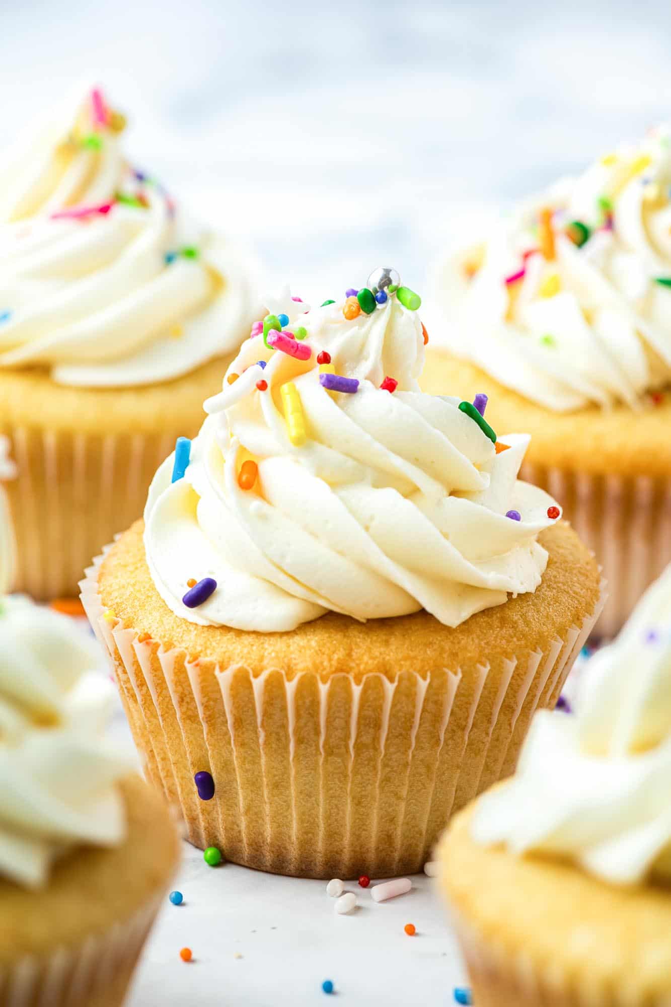 Vanilla cupcakes with sprinkles