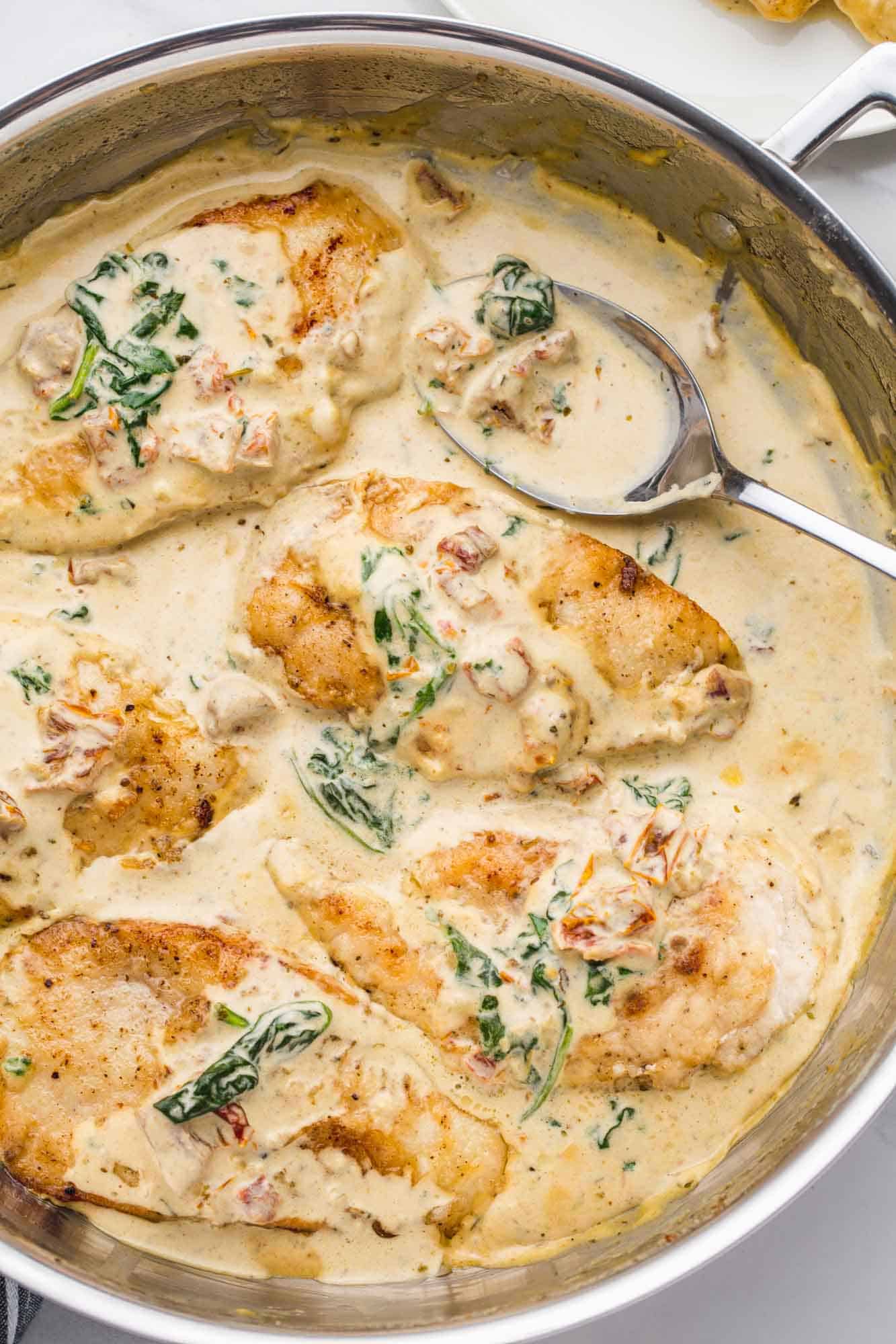 Overhead shot of a skillet with creamy tuscan chicken