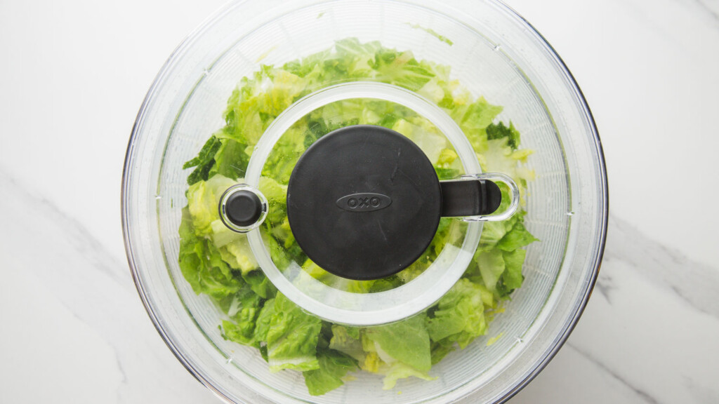 top down view of lettuce in a oxo salad spinner