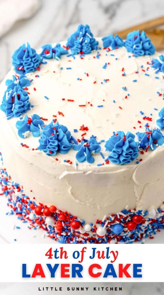 a layer cake decorated with white icing, blue icing borders, and fourth of july sprinkles, viewed from above. text at the bottom of the image says 4th of july layer cake in red and blue letters on a white background