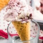 Cherry swirl icecream served on a waffle cone