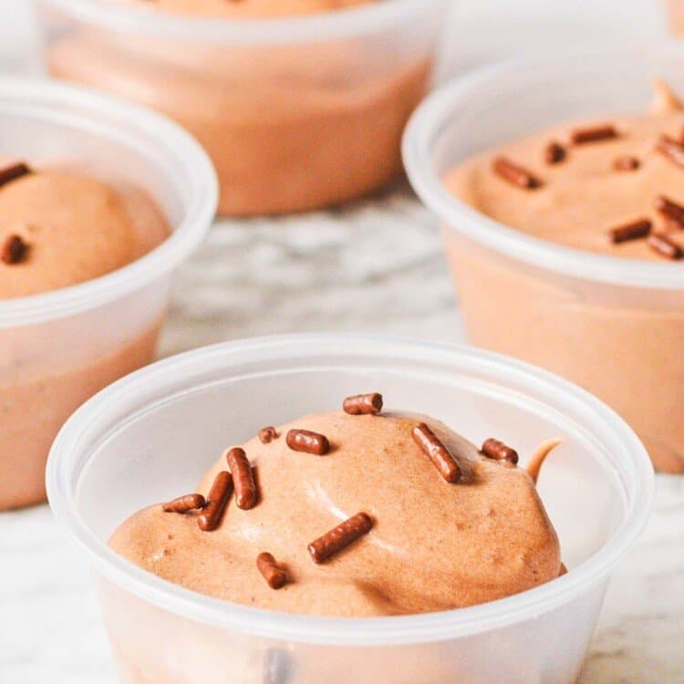 chocolate pudding shots topped with sprinkles in 2 ounce portion cups