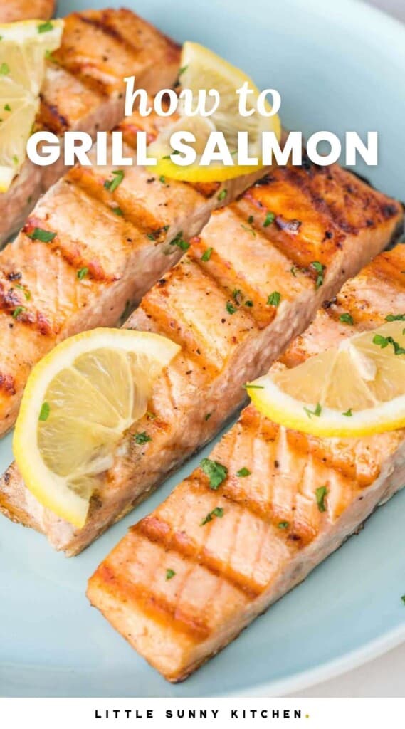 Overhead shot of 3 4 grilled salmon fillets with lemon slices, and overlay text that says "how to grill salmon"