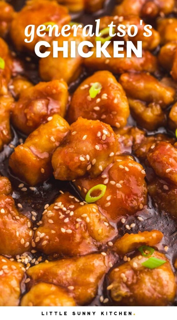 closeup view of general tso's chicken cooking in sauce in a skillet