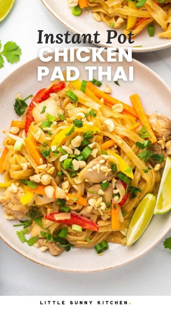 Overhead shot of 2 bowls of chicken pad thai with lime wedges on the side. With overlay text that says "Instant Pot Chicken Pad Thai"