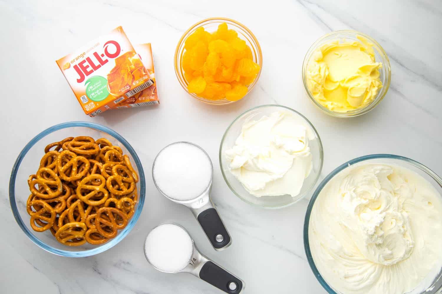the ingredients needed to make pretzel salad with mandarin oranges and jello