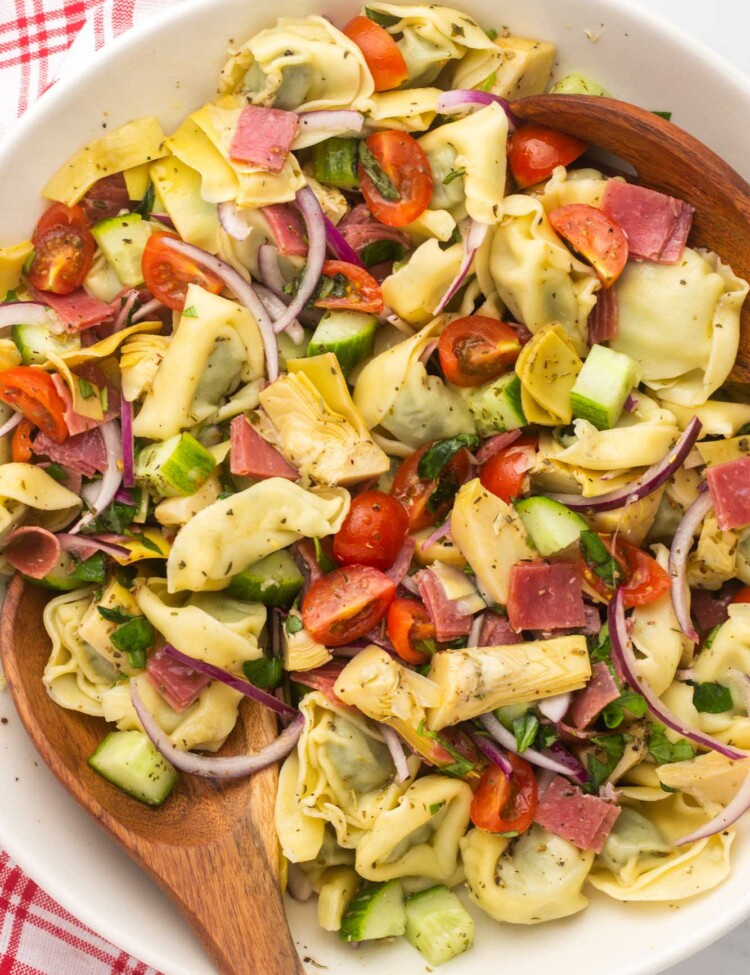 a large bowl of tortellini pasta salad viewed from above