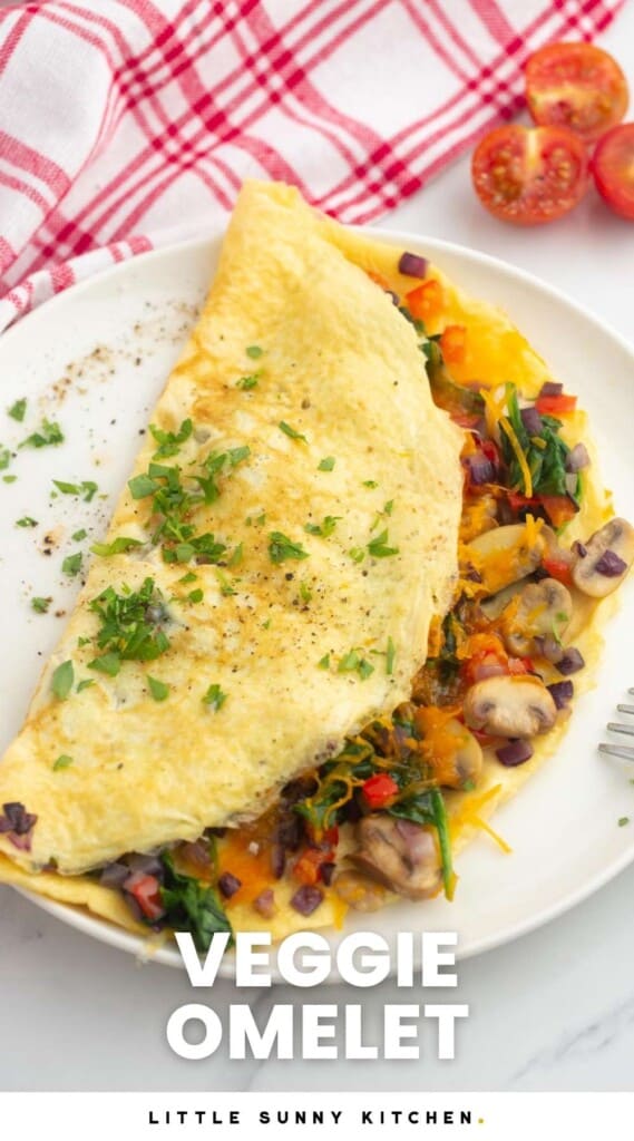 a folded egg omelet filled with veggies