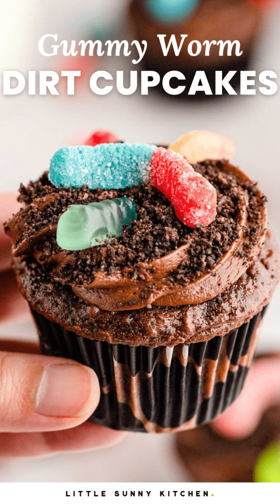 a chocolate cupcake topped with worms and dirt. Text at top of photo says "gummy worm dirt cupcakes"