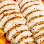 Sliced turkey tenderloin with roasted veggies and fresh sage