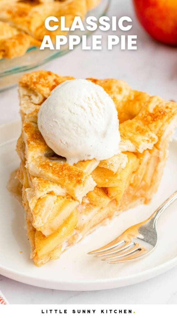 a large slice of apple pie with a lattice top. there's a scoop of ice cream on top of the pie, which is on a plate. there's a fork on the plate.