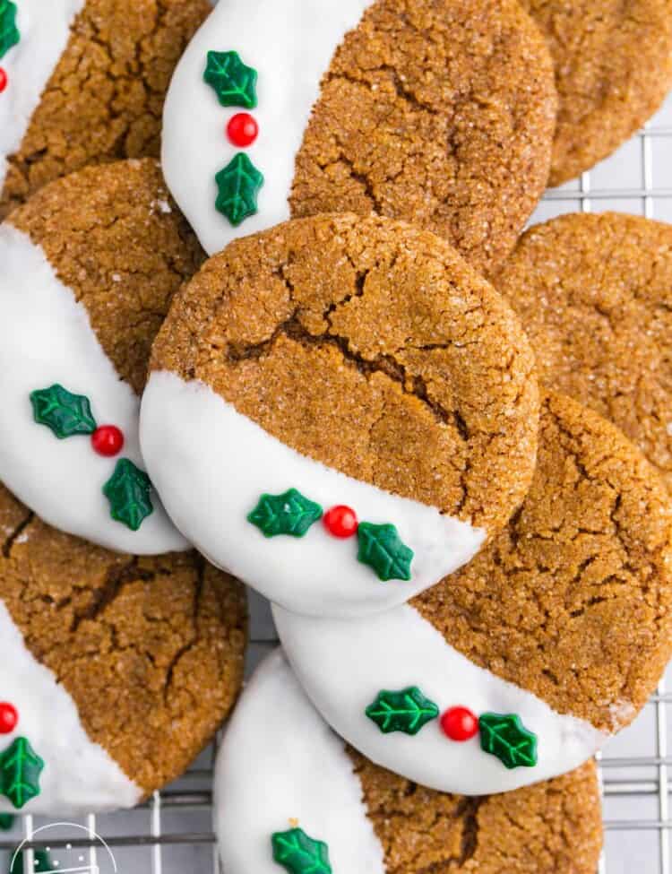 Overhead shot of decorated gingersnap cookies on a wire rack