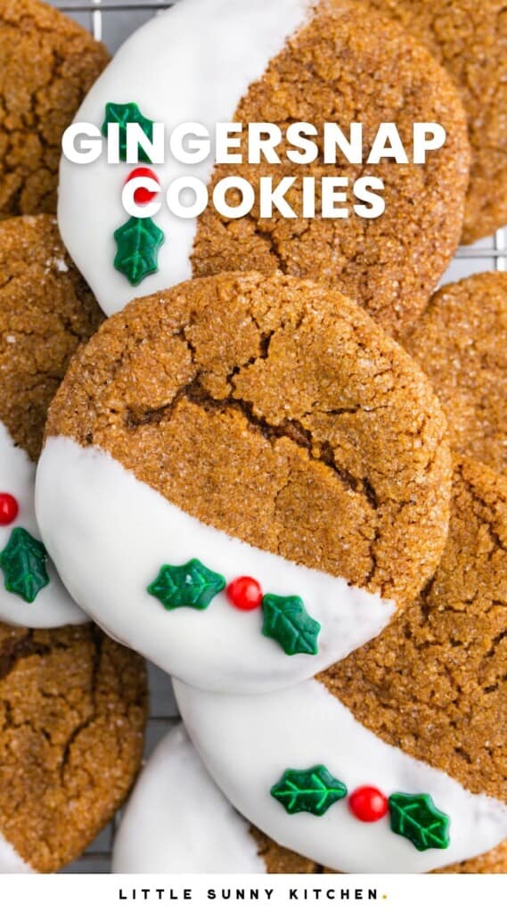 Overhead shot of decorated gingersnap cookies on a wire rack, and overlay text that says "gingersnap cookies"
