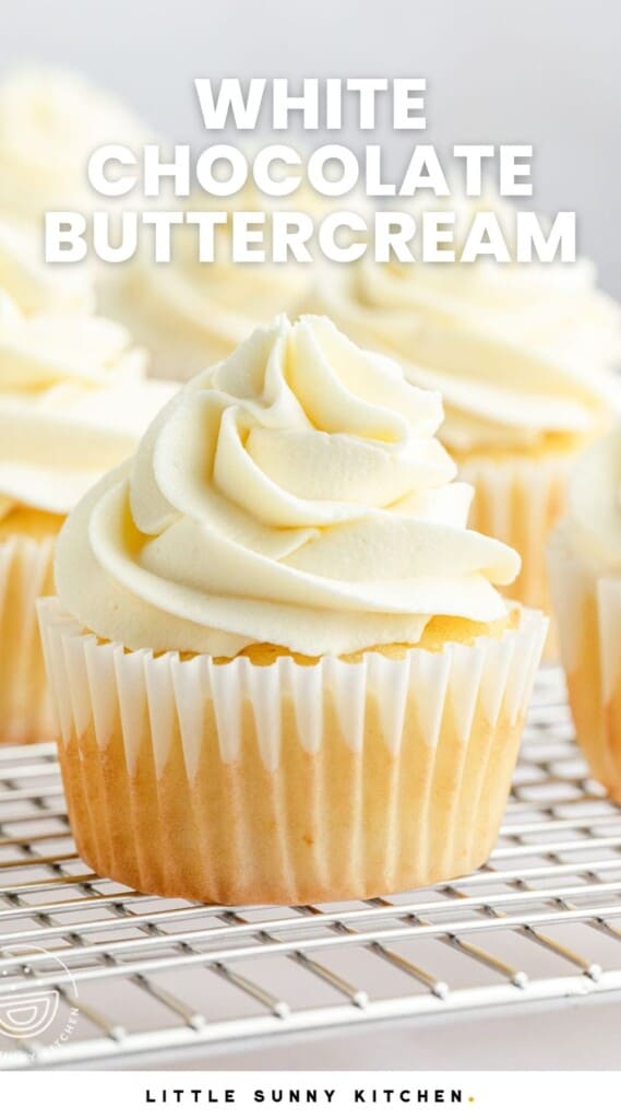 A cupcake frosted with white chocolate buttercream. And overlay text that says "white chocolate buttercream"