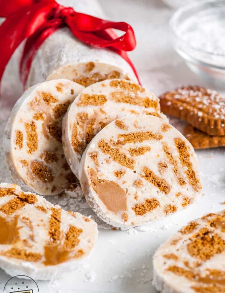 Sliced white chocolate salami with biscoff cookie pieces.