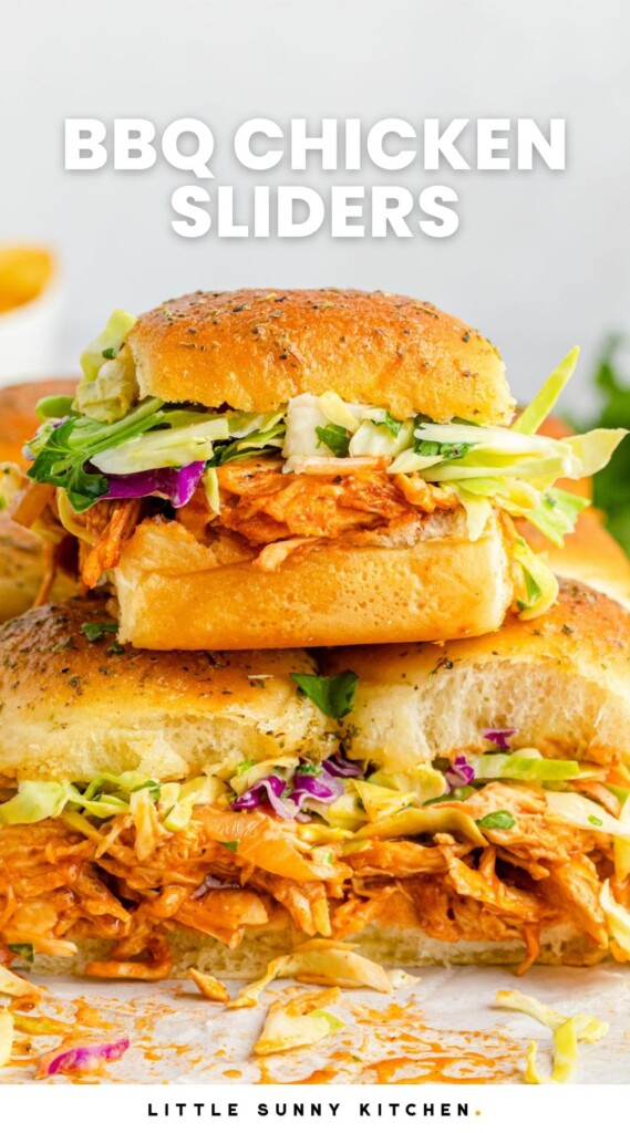 a stack of bbq chicken sliders on hawaiian rolls with coleslaw. Text overlay says "bbq chicken sliders"