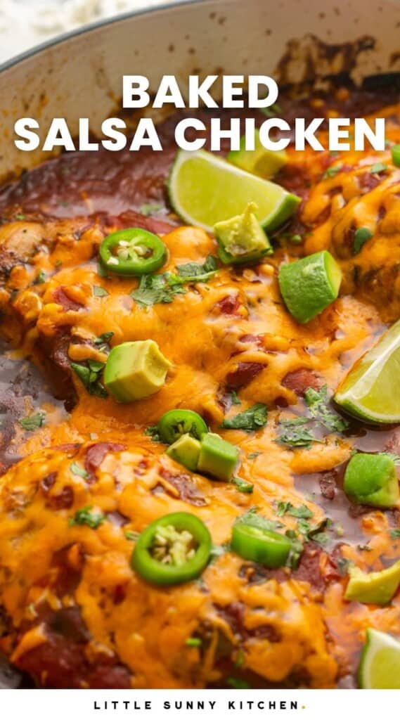 a pan of baked chicken with salsa, topped with cheese, diced avocado, lime wedges. Text overlay says "baked salsa chicken"