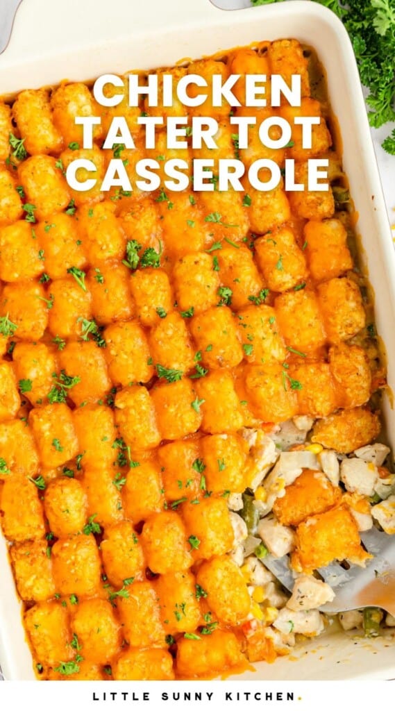 Overhead shot of a chicken tater tot casserole in a 9x13 inch dish. And overlay text that says "chicken tater tot casserole"