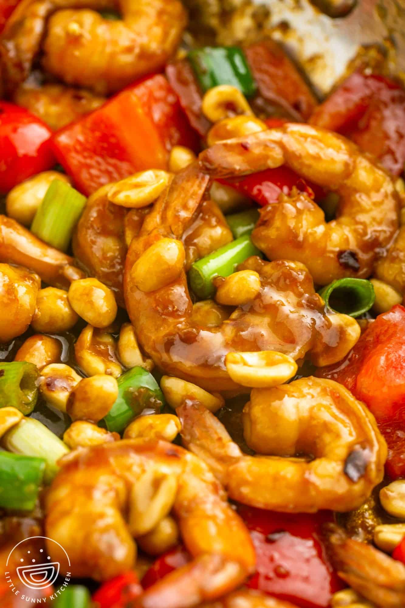 Close up shot of kung pao shrimp in a skillet