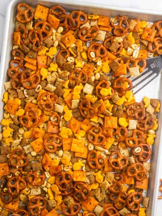 homemade chex mix on a baking sheet.