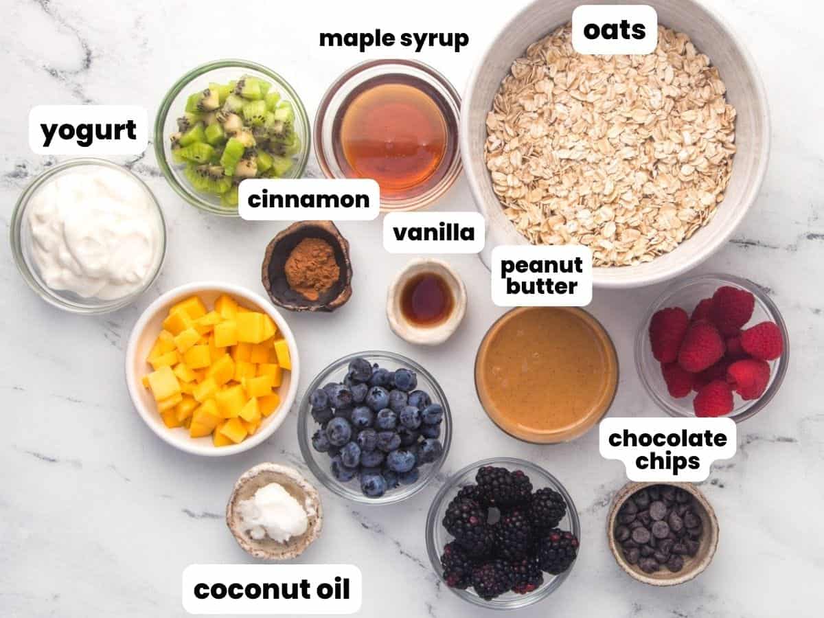 The ingredients needed to make baked oatmeal cups with yogurt and fresh fruit.