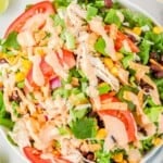a large bowl of chicken tex mex chopped salad, viewed from above