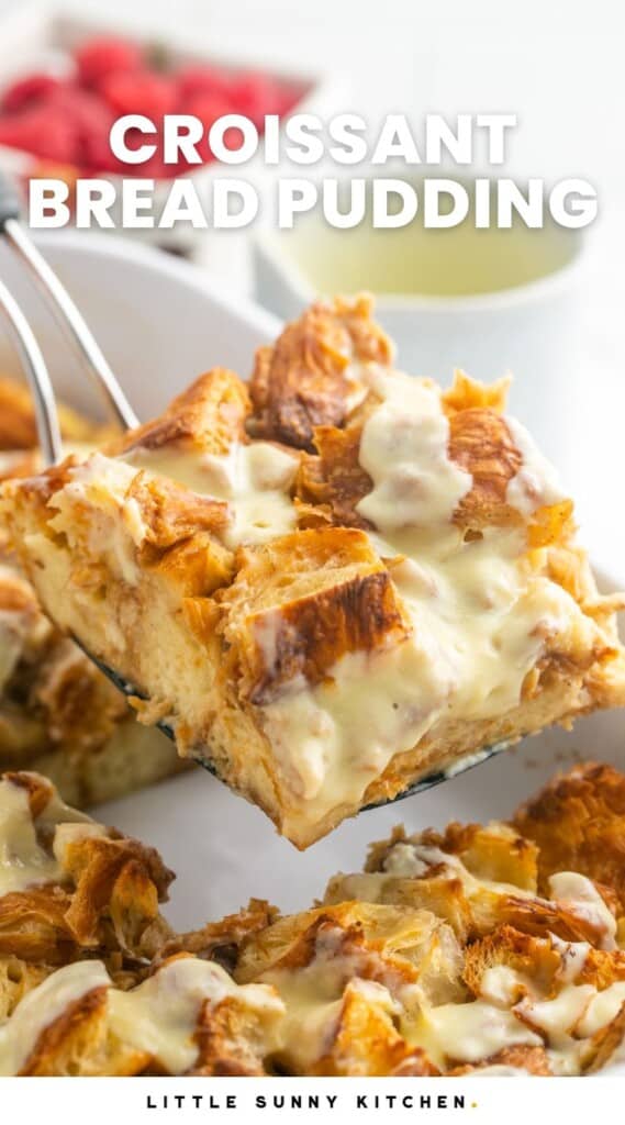 a spatula holding up a square of bread pudding with vanilla sauce. Text overlay says "Croissant Bread Pudding"