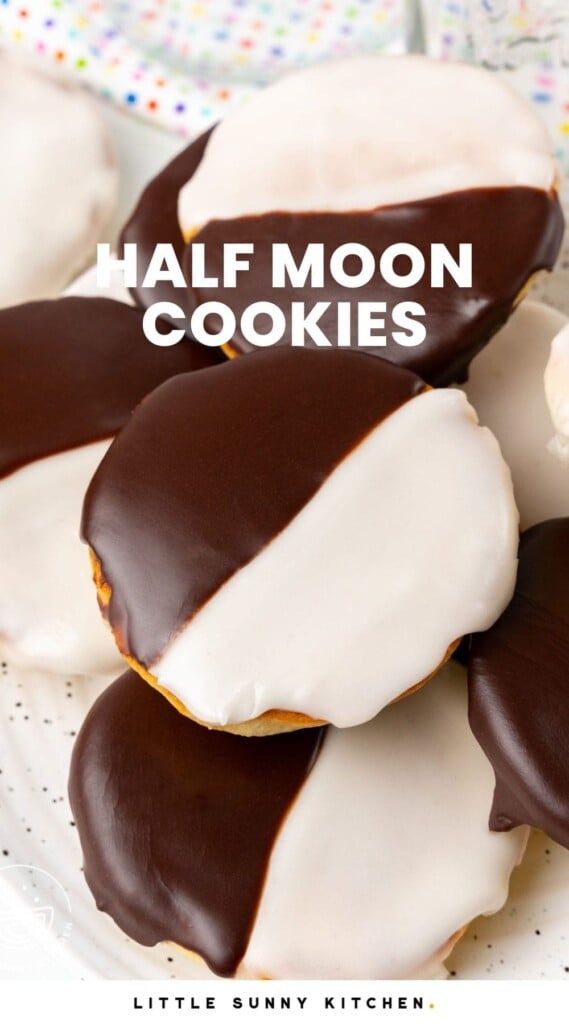a plate of black and white frosted half moon cookies. Text overlay says "half moon cookies"