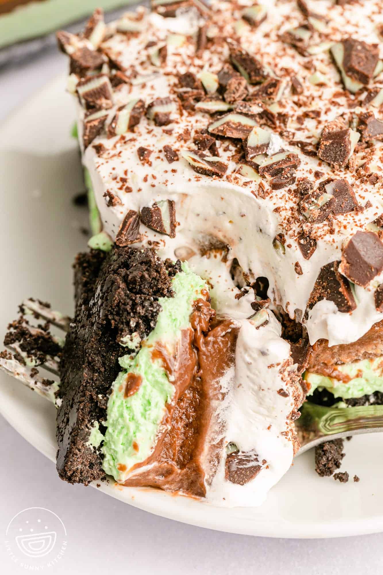 a bite of mint chocolate lasagna on a fork