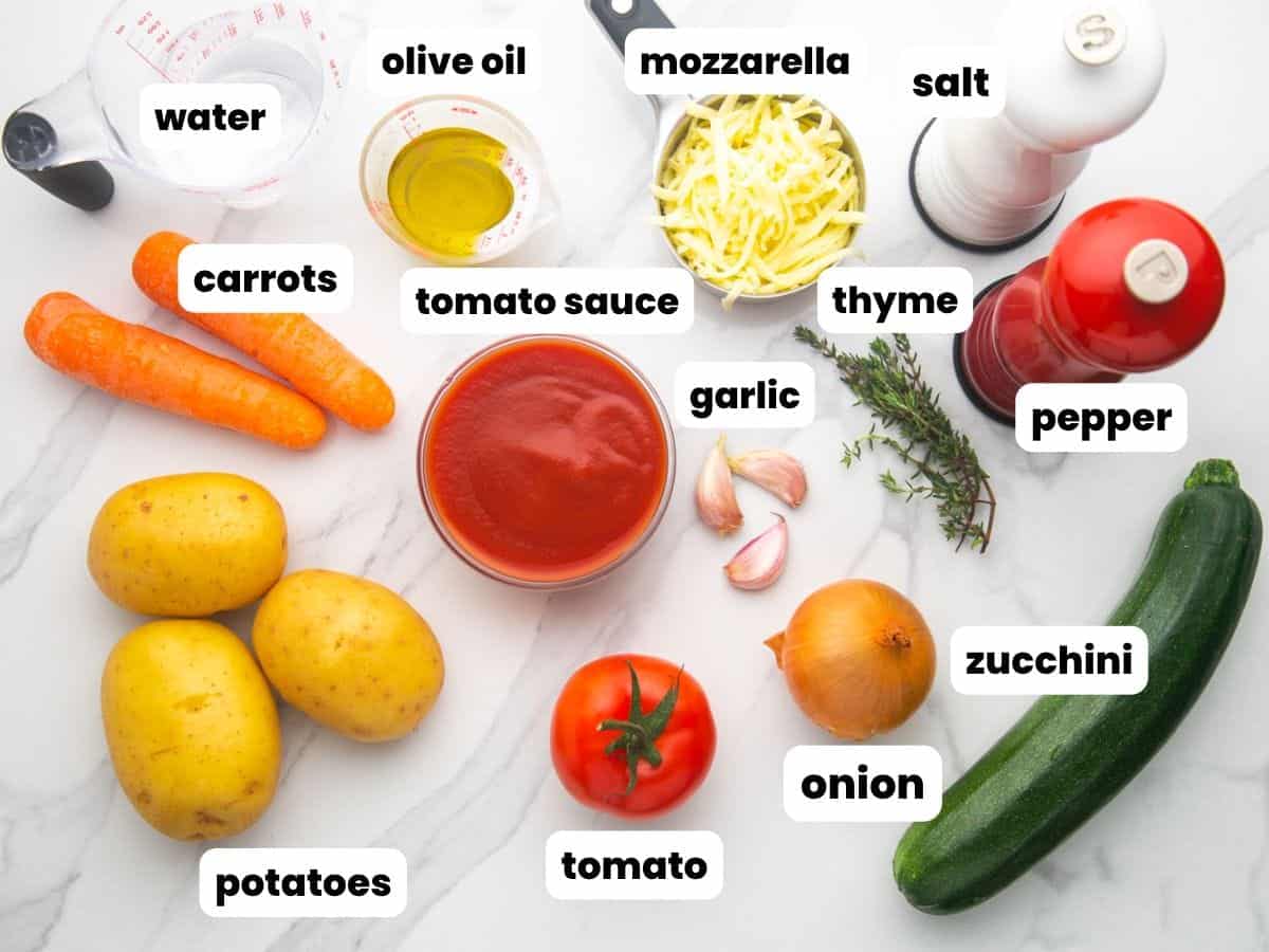 The ingredients needed to make baked potatoes with veggies.