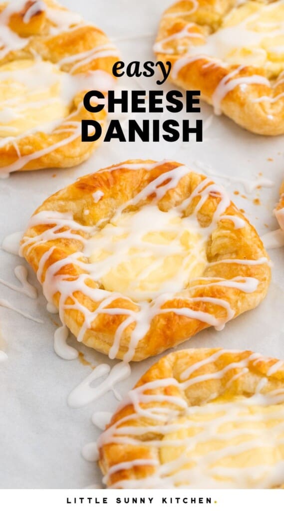 square danish filled with cheese and drizzled with icing on parchment paper. Text overlay says "easy cheese danish"
