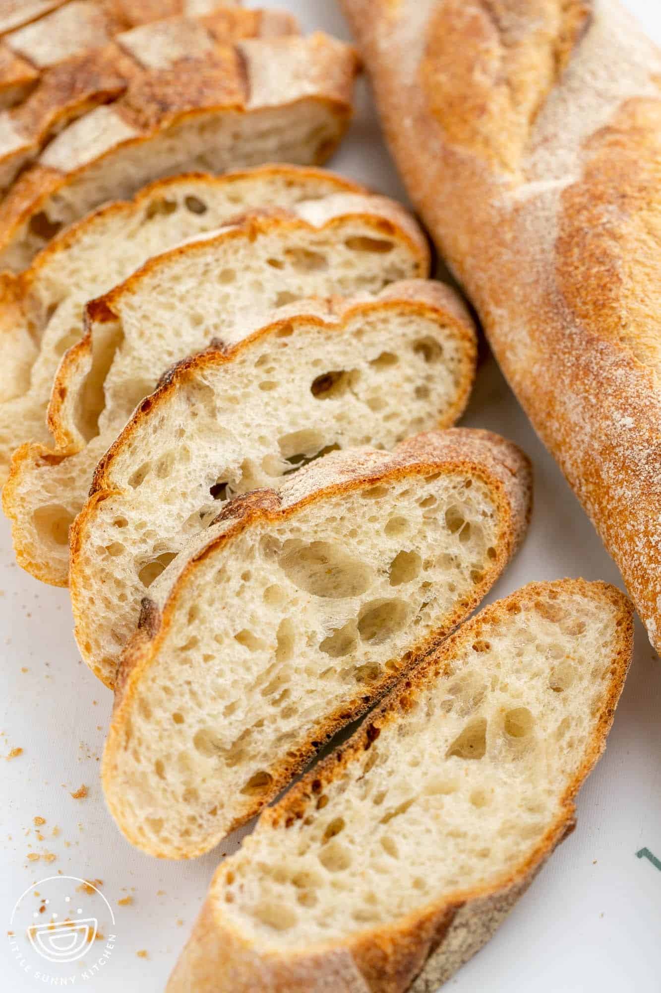 a baguette sliced into thin rounds for crostini