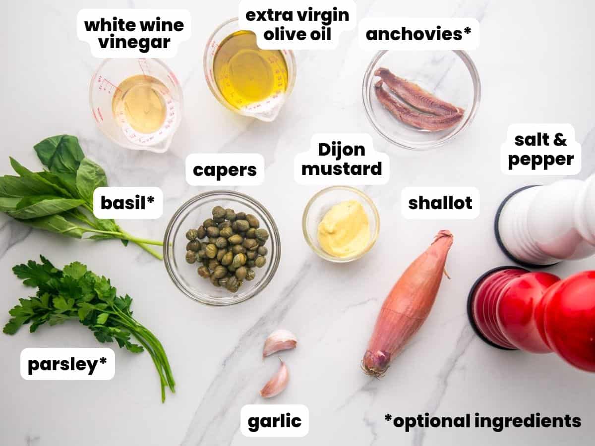 Ingredients needed to make fresh homemade nicoise salad dressing.
