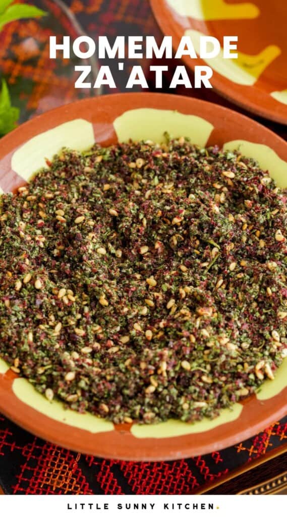 Za’atar Spice in a small oriental brown bowl. And overlay text that says "Homemade Za'atar"