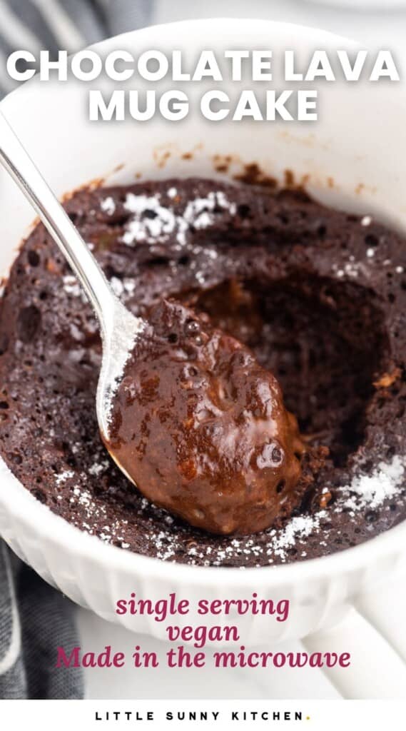Overhead shot with an angle of chocolate lava mug cake and a spoon showing the soft center. With overlay text that says "chocolate lava mug cake"